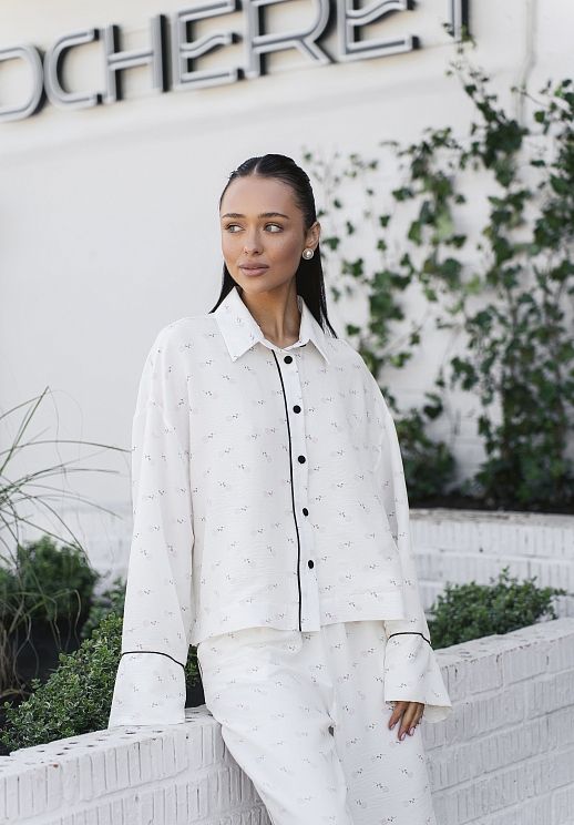 Костюм на гудзиках молочний в піони